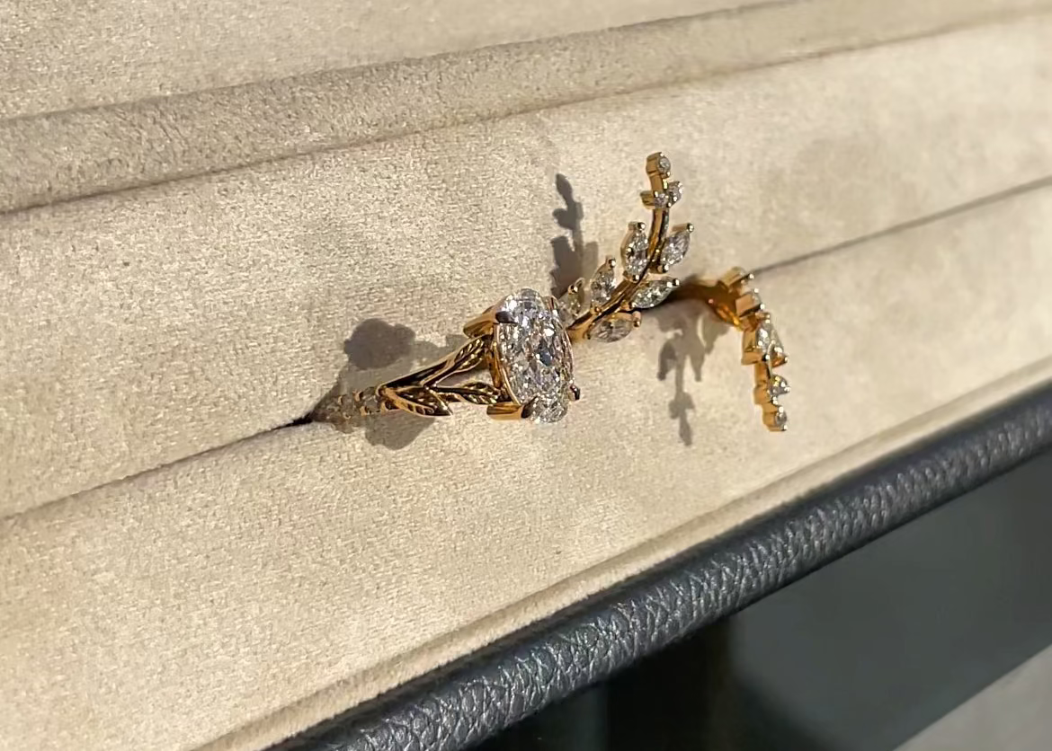 Gold Ring Set on a branded jewelry box