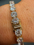 Gold bracelet with diamond stones on a wrist