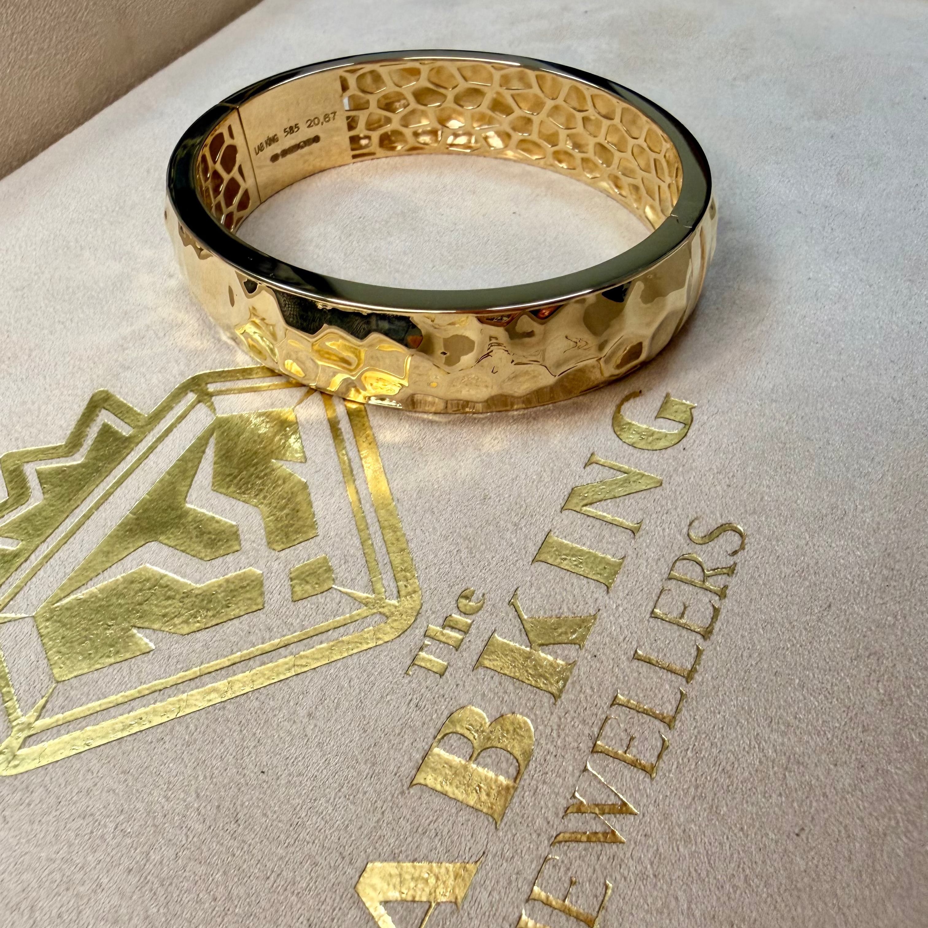 Gold bracelet on a branded jewelry box with 'Lab King Jewellers' logo.